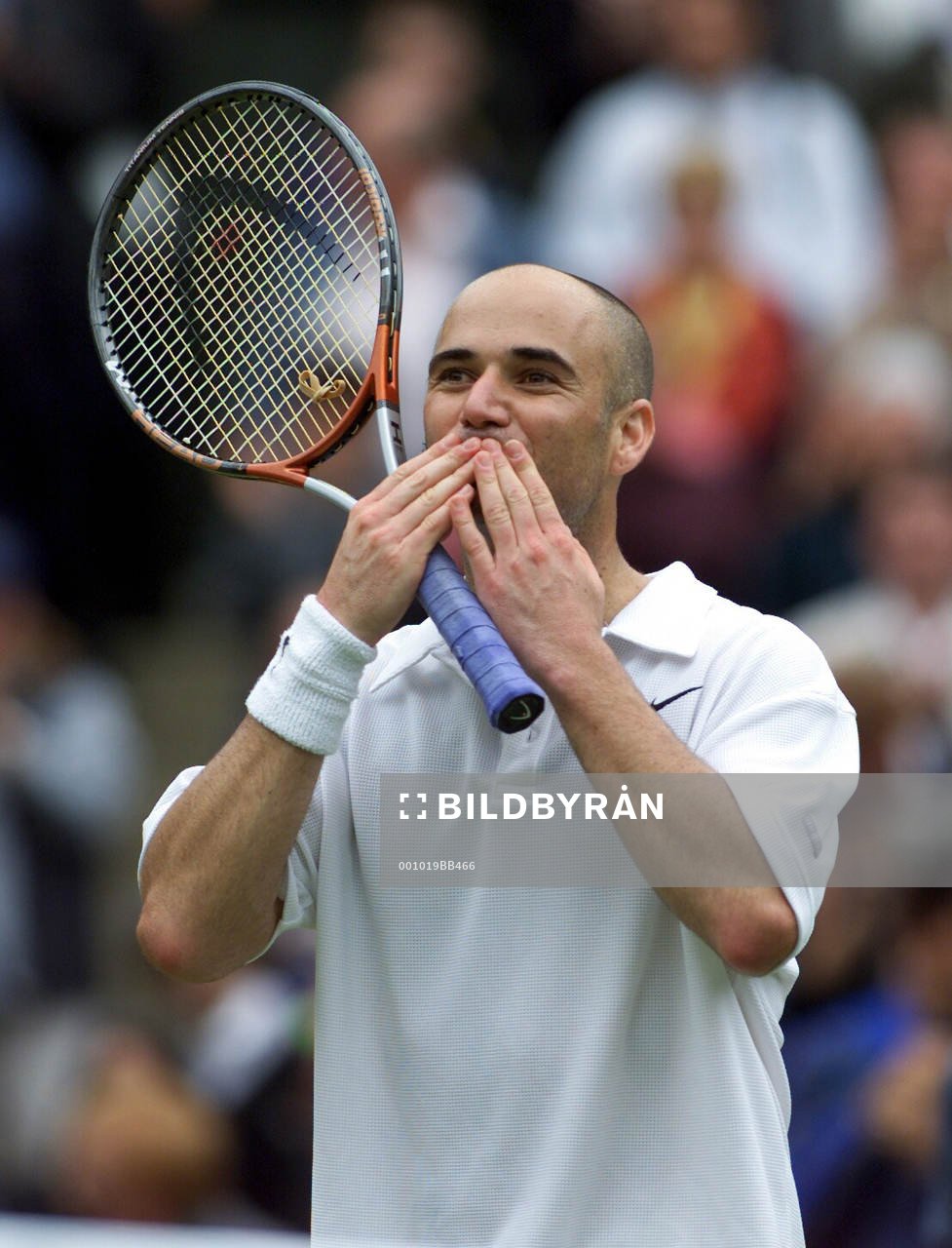 Mark Philippoussis - Andre Agassi: Andre Agassi jublar
