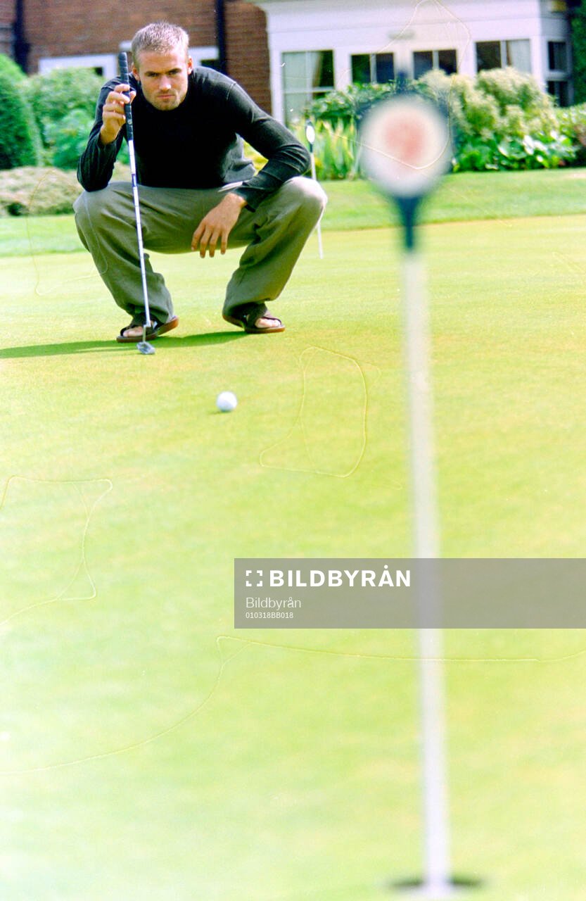 Football, Premier League 2001-2002, Aston Villa: Olof Mellberg of Aston Villa playing golf. 