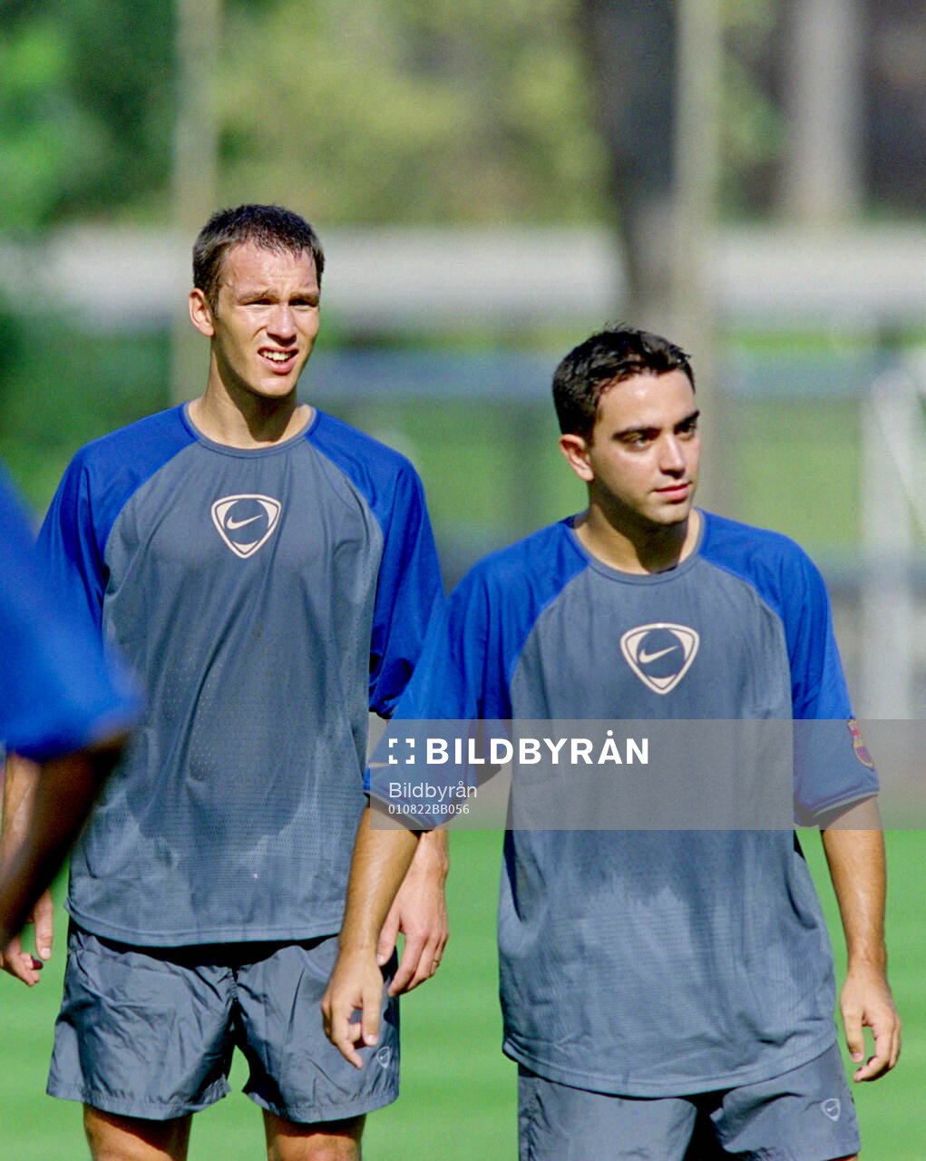 Patrik Andersson and Xavi of Barcelona