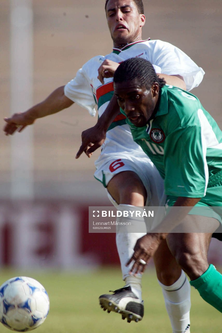 Augustine Okocha, Nigeria tar sig förbi Mansouri, Algeriet