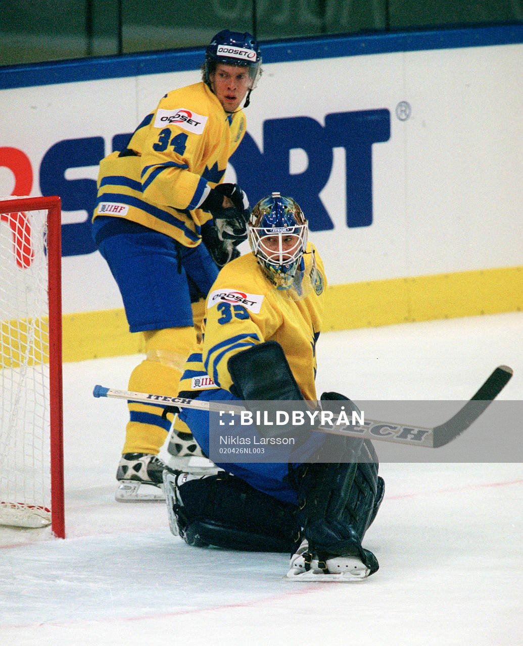 Daniel Tjärnqvist och Tommy Salo, målvakt, Sverige
