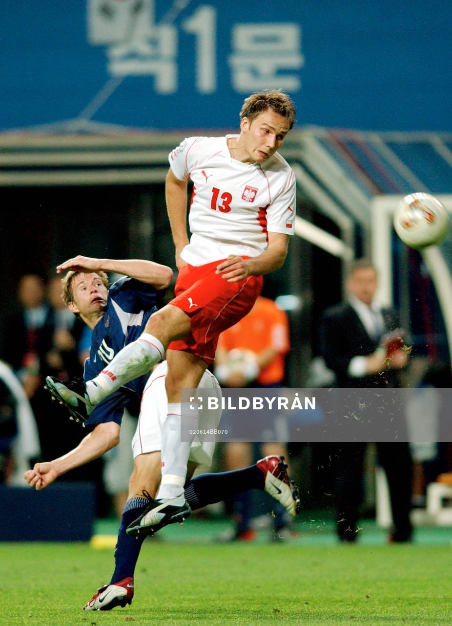 Arkadiuz Glowacki, Polen och Brian McBride, USA