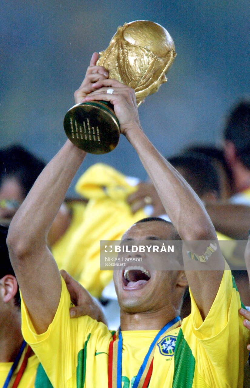 Rivaldo med bucklan. Glädje, pokal, buckla