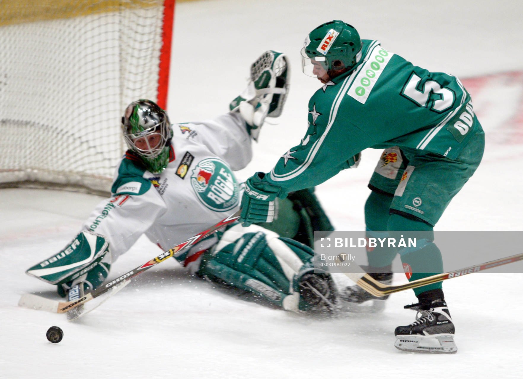 Magnus Wennström, målvakt, Rögle och Johnny Oduya,