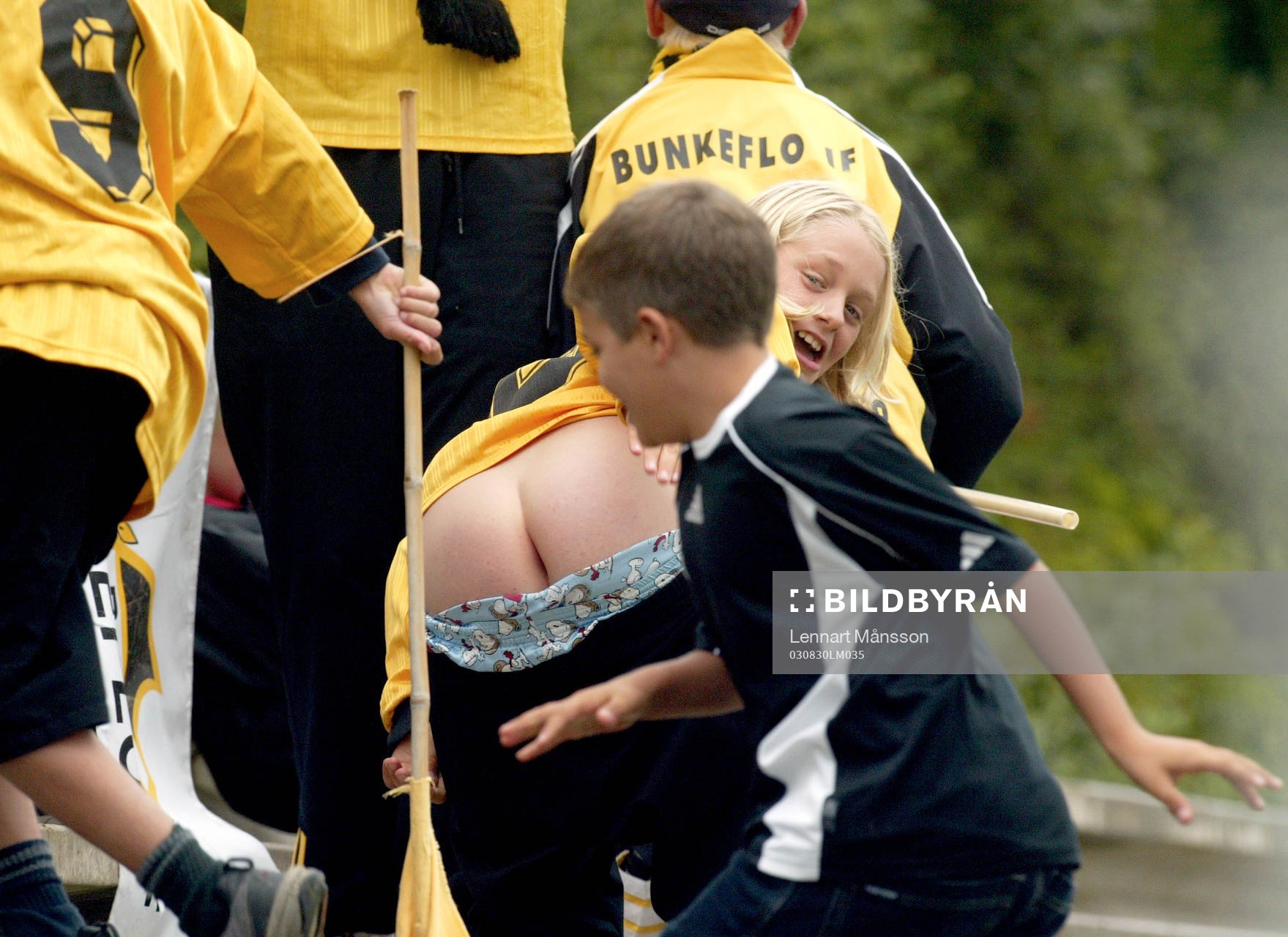 Supporter, fan, visar baken