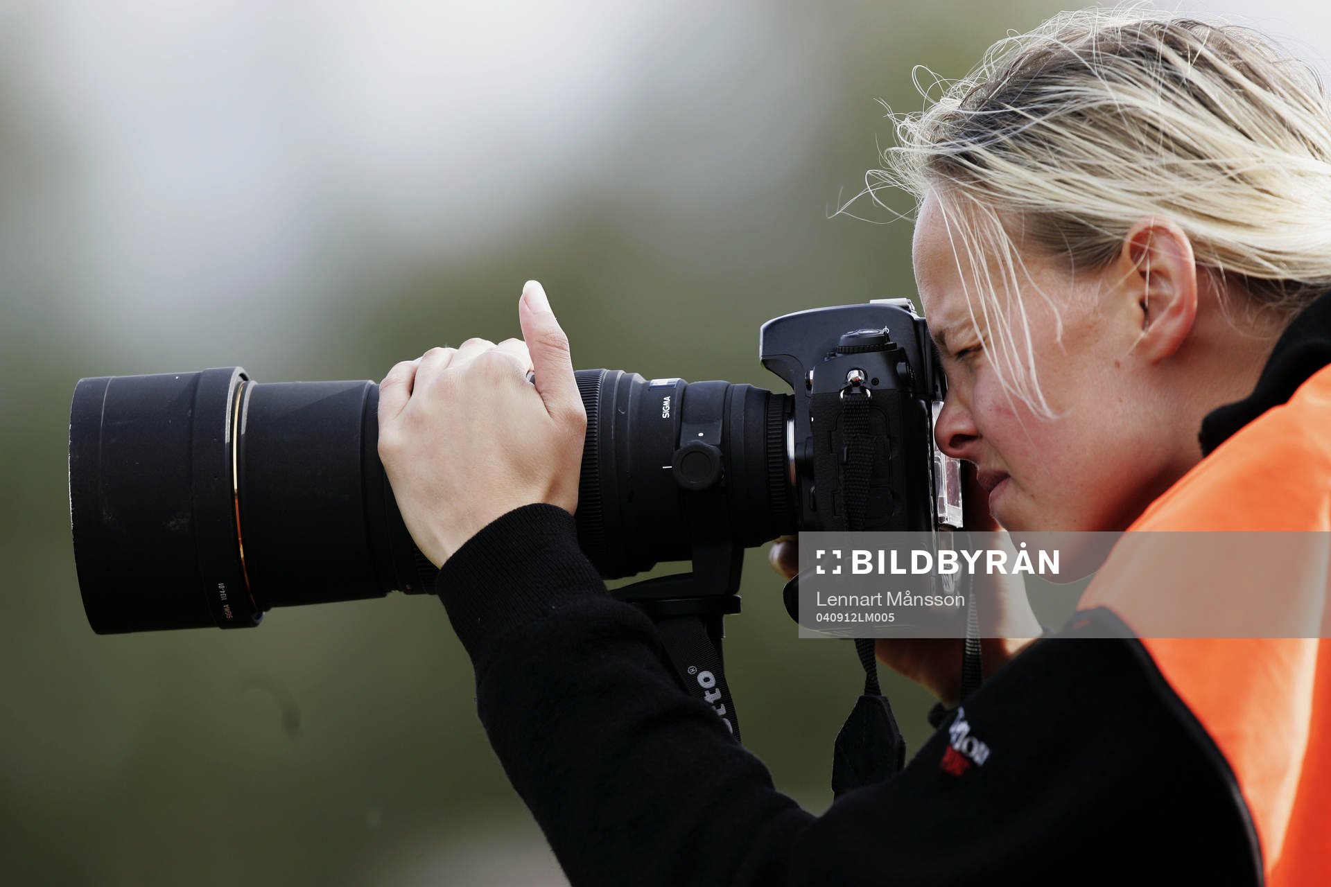 Pressfotograf, kvinnlig