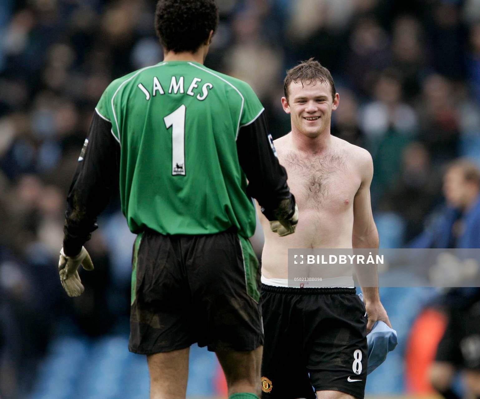  Manchester City's David James och Manchester United's Wayne Rooney.