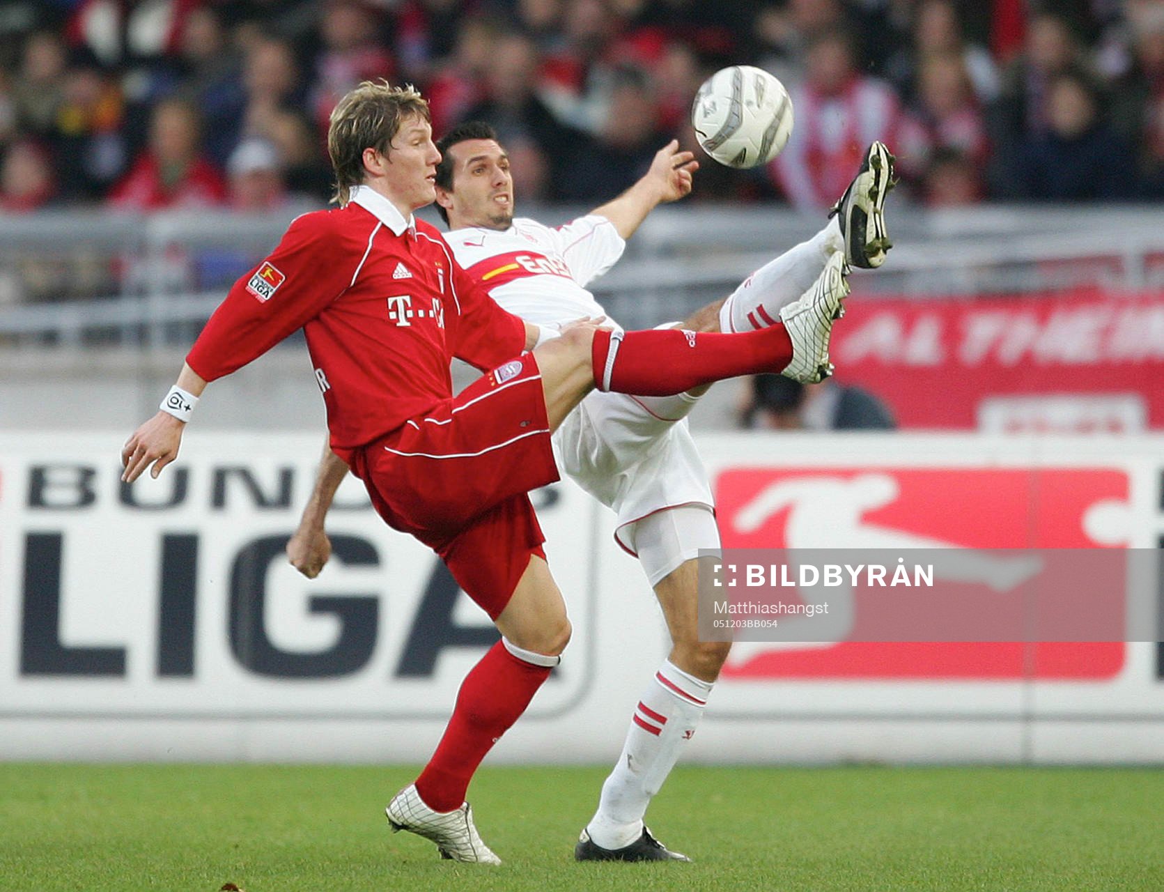   Bastian Schweinsteiger, Bayern och Martin Stranzl, Stuttgart.