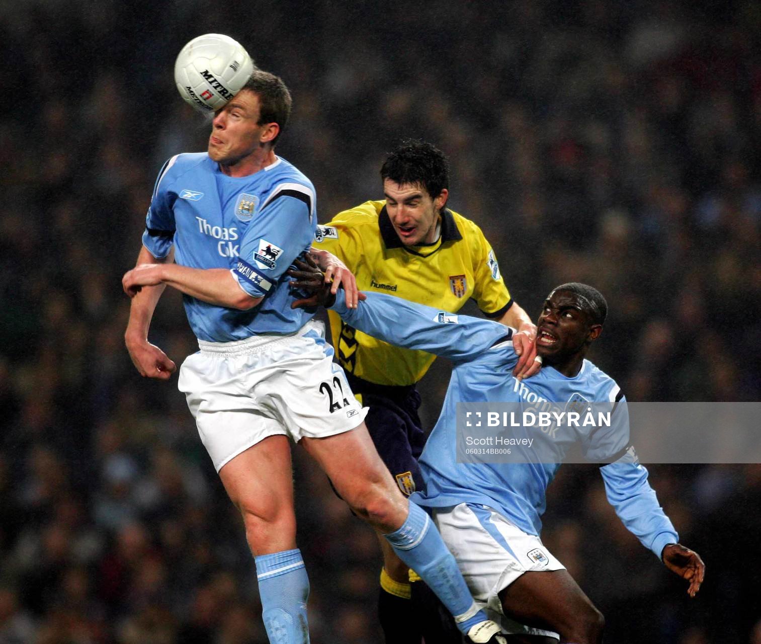   David Dunne och Micah Richards, Manchester och Liam Ridgewell, Aston Villa