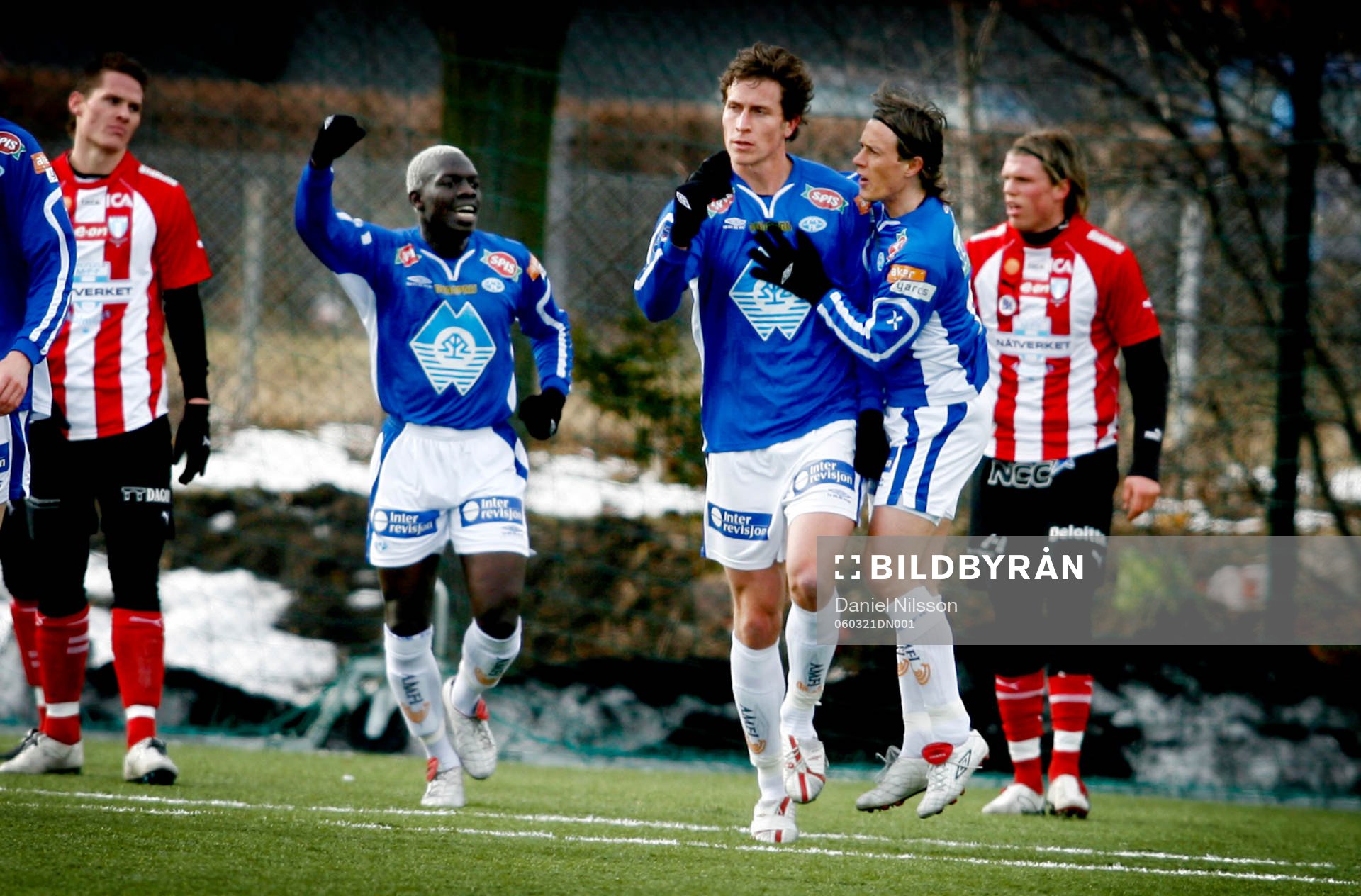 Rob friend (i mitten), Molde, jublar
