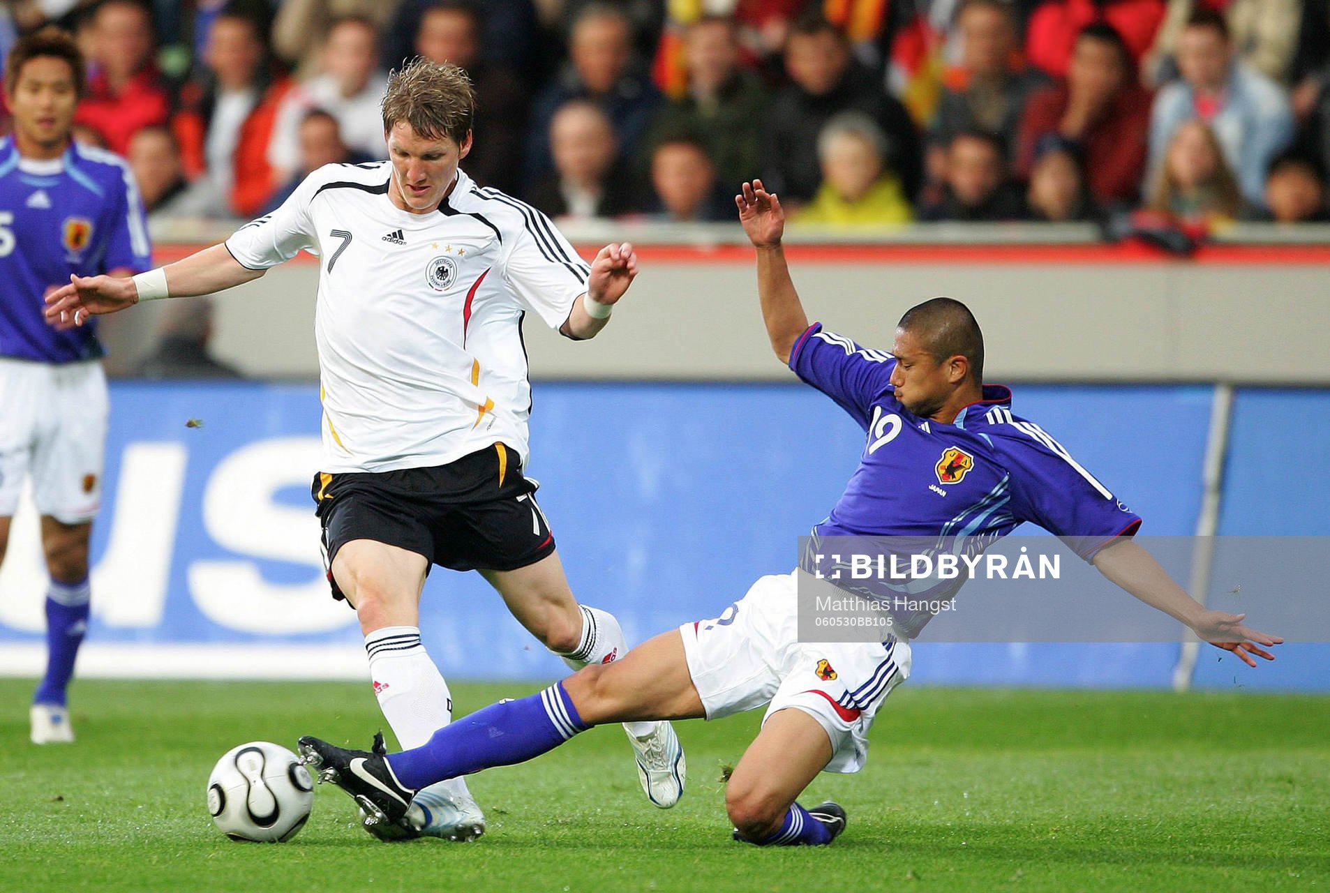 Bastian Schweinsteiger, Tyskland och Keisuke Tsuboi, Japan