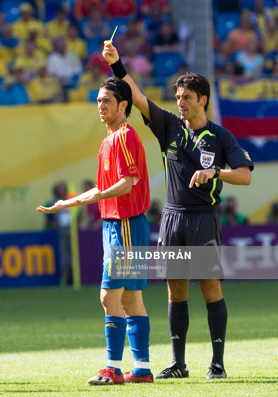 Domare, gult kort, varning. Luis Garcia, Spanien