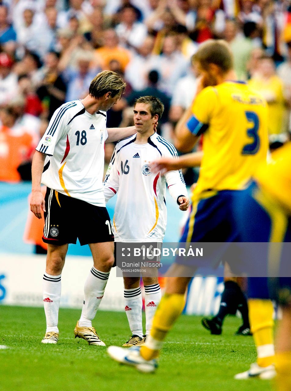 Olof Mellberg, Sverige,  depp och Tim Borowski och Philipp