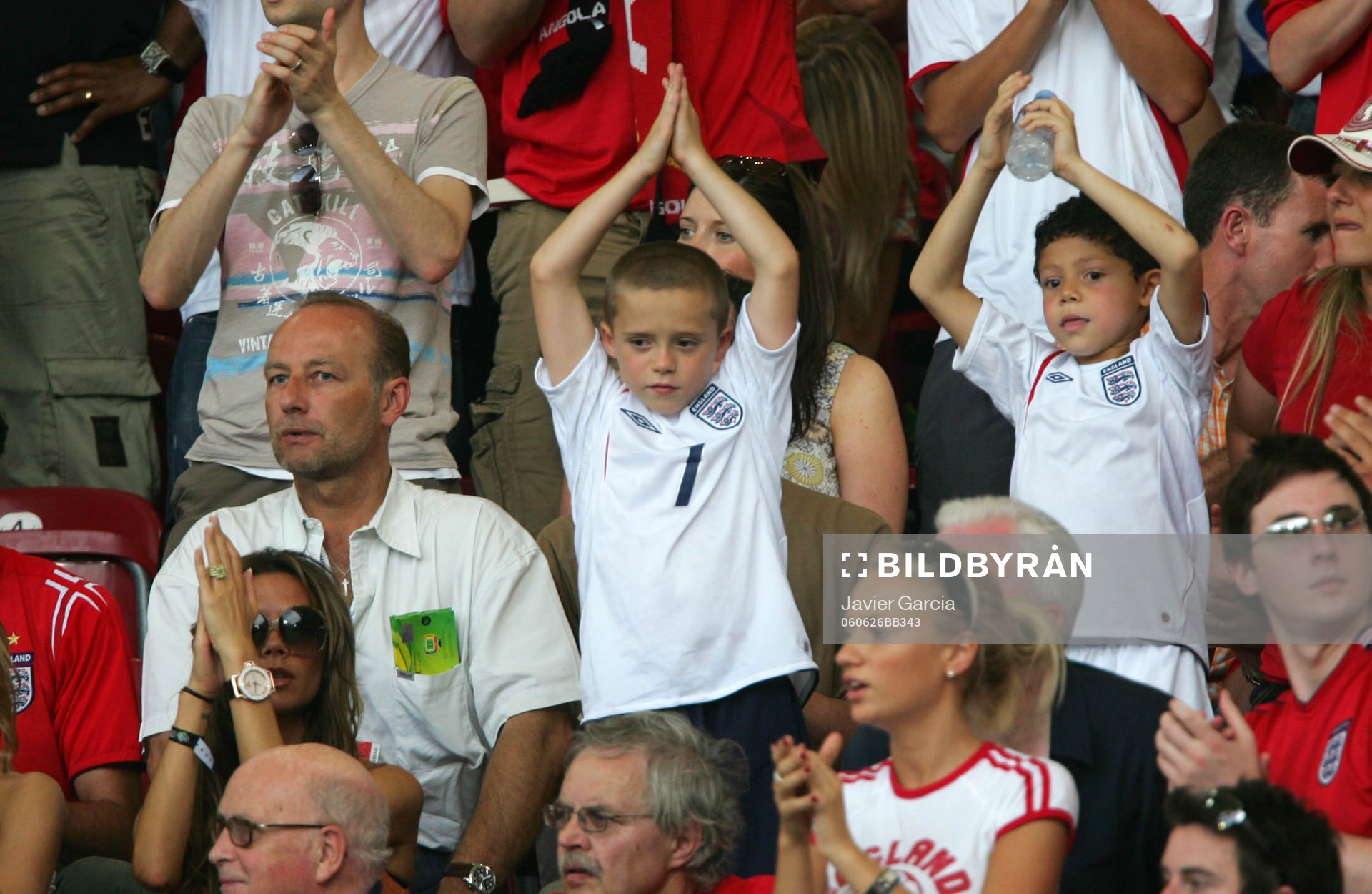 Victoria och Brooklyn Beckham (Fru och son till David