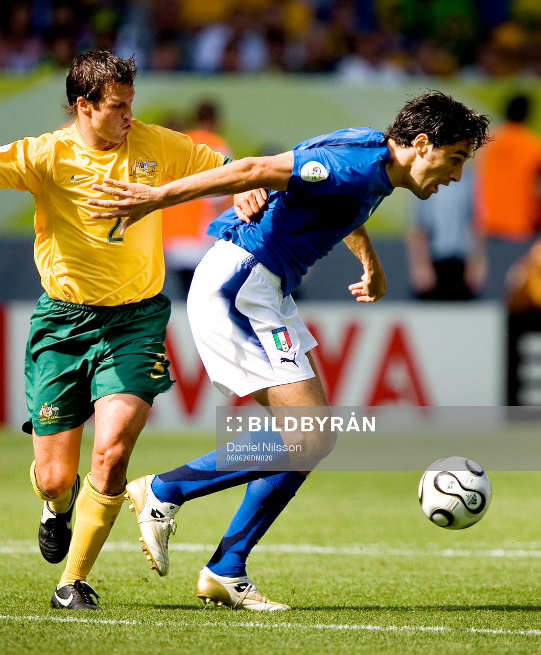 Luca Toni, Italien och Lucas Neill, Australien