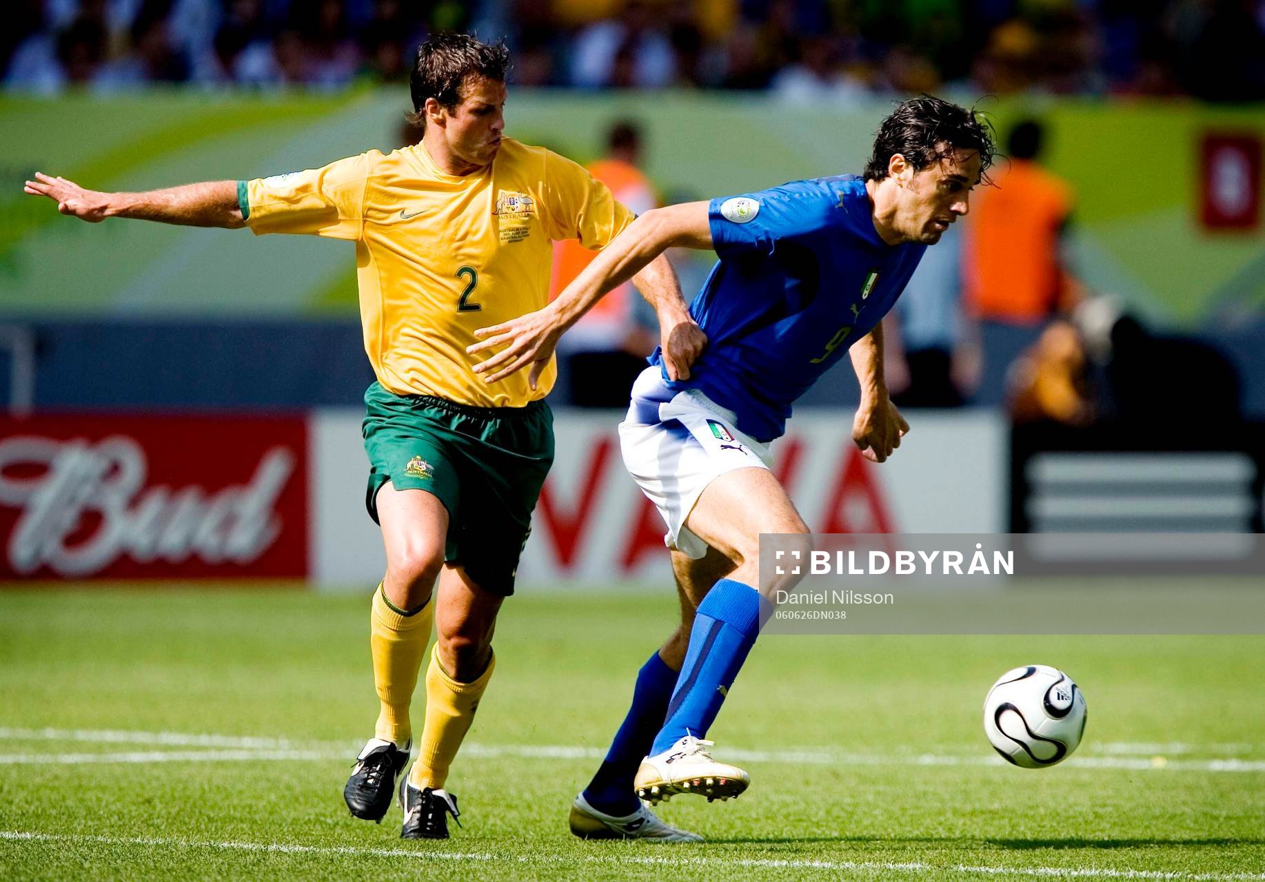 Luca Toni, Italien och Lucas Neill, Australien
