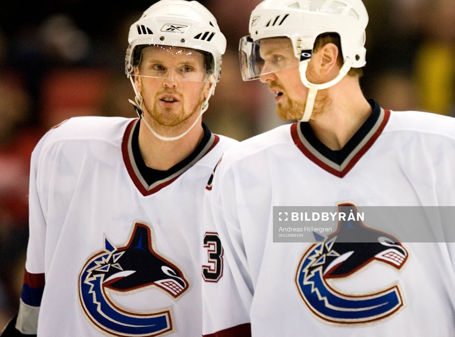 Daniel Sedin och Henrik Sedin (i förgrunden)