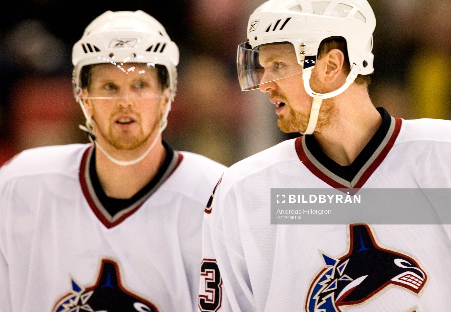 Daniel Sedin och Henrik Sedin (i förgrunden)