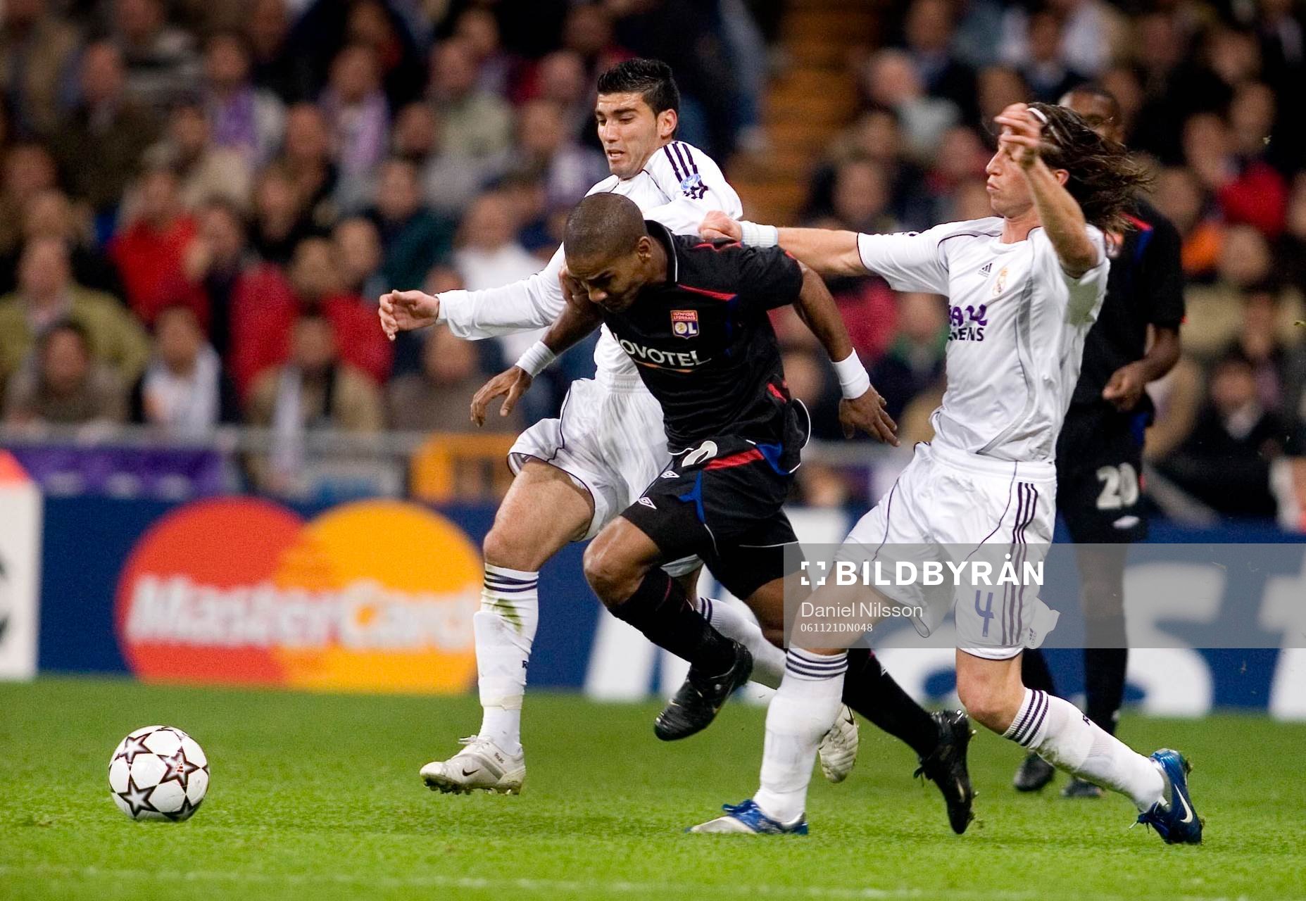 Florent Malouda, Lyon och Guti och Sergio Ramos, Real Madrid