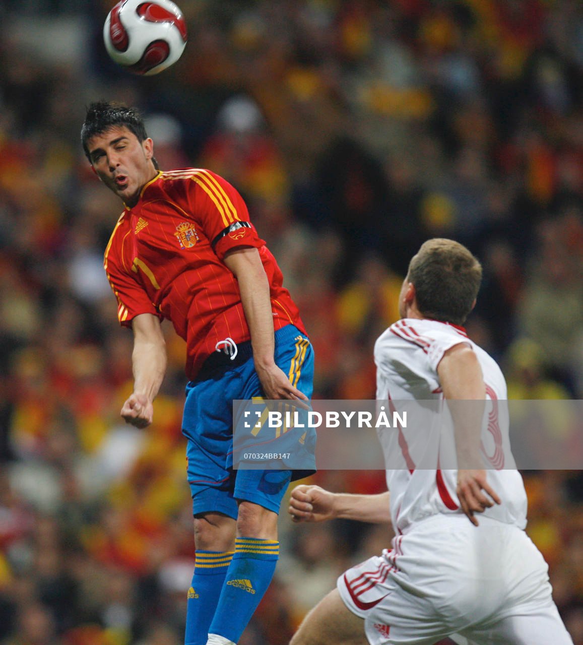 Michael Gravgaard, Danmark och David Villa, Spanien