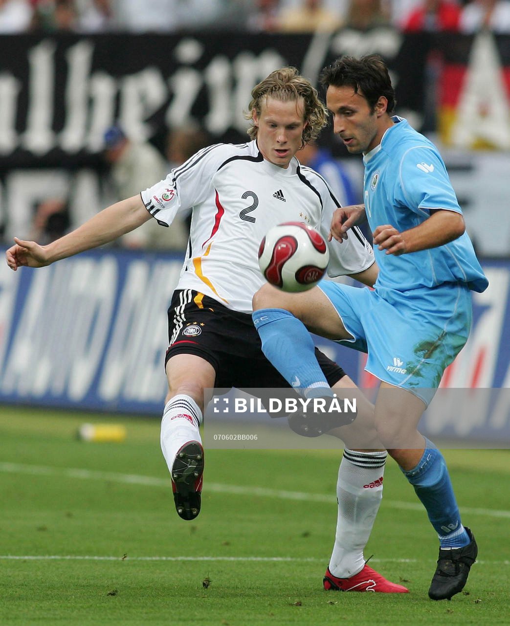Marcell Jansen, Tyskland och Cristian Negri, San Marino
