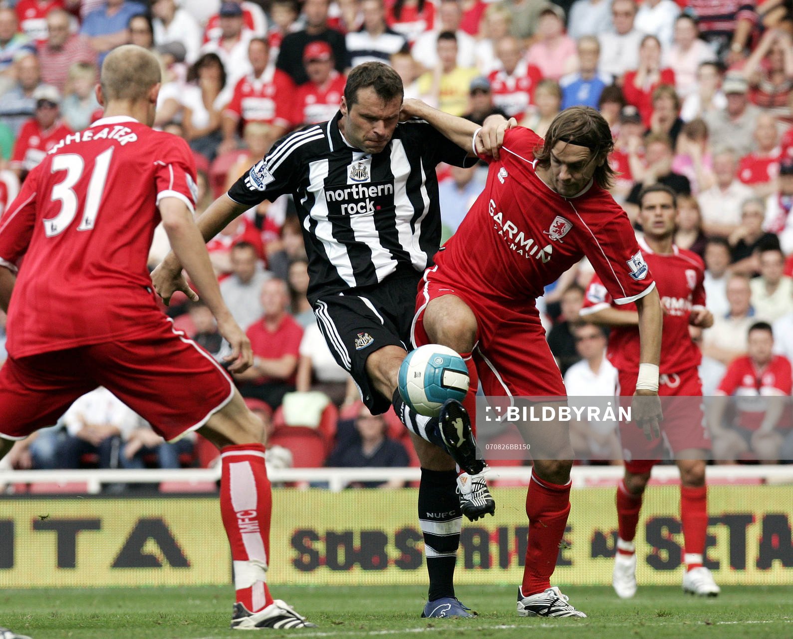  Jonathan Woodgate och Mark Viduka 