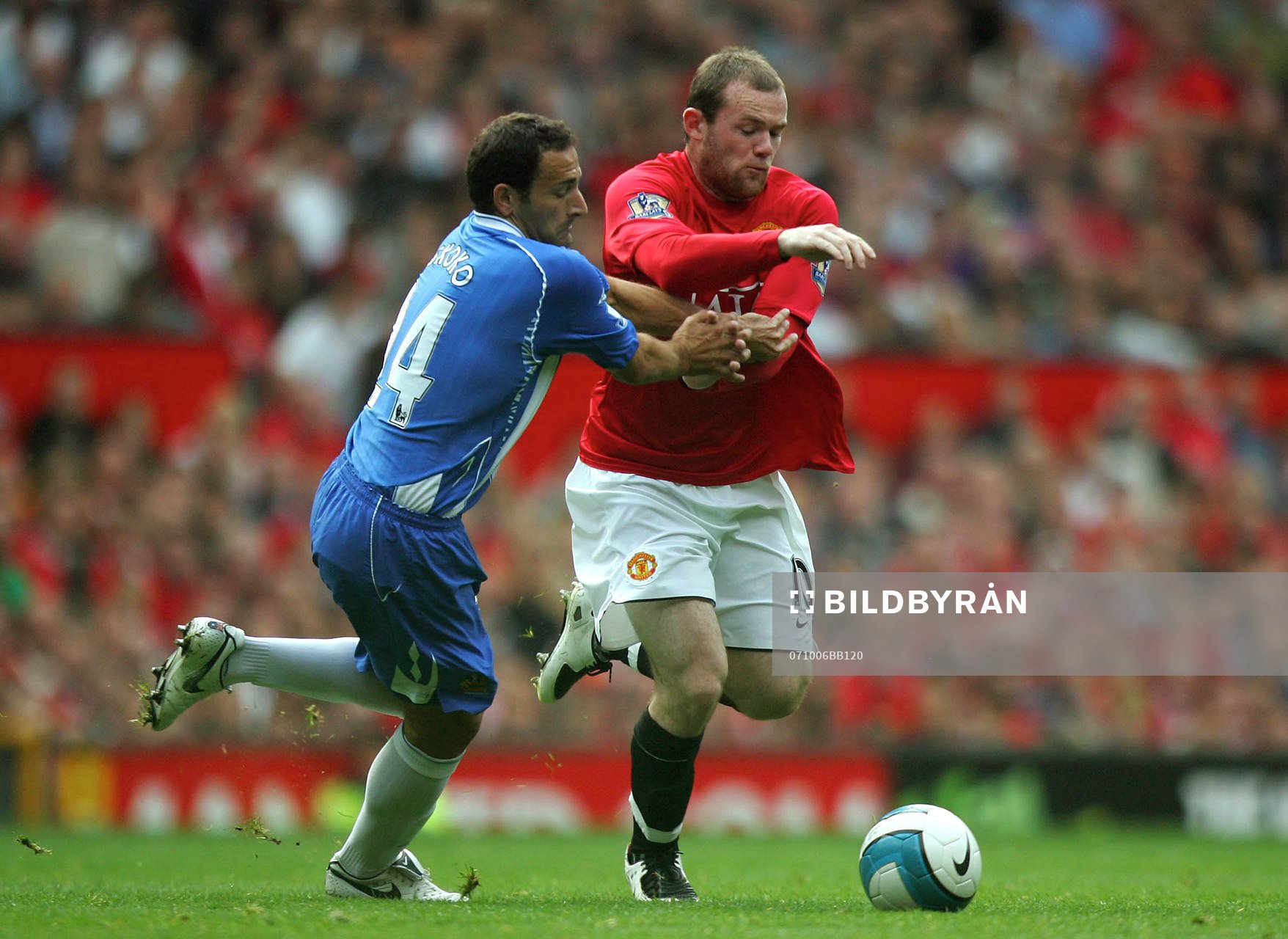  Wayne Rooney, Manchester United och Josip Skoko, Wigan Athletic
