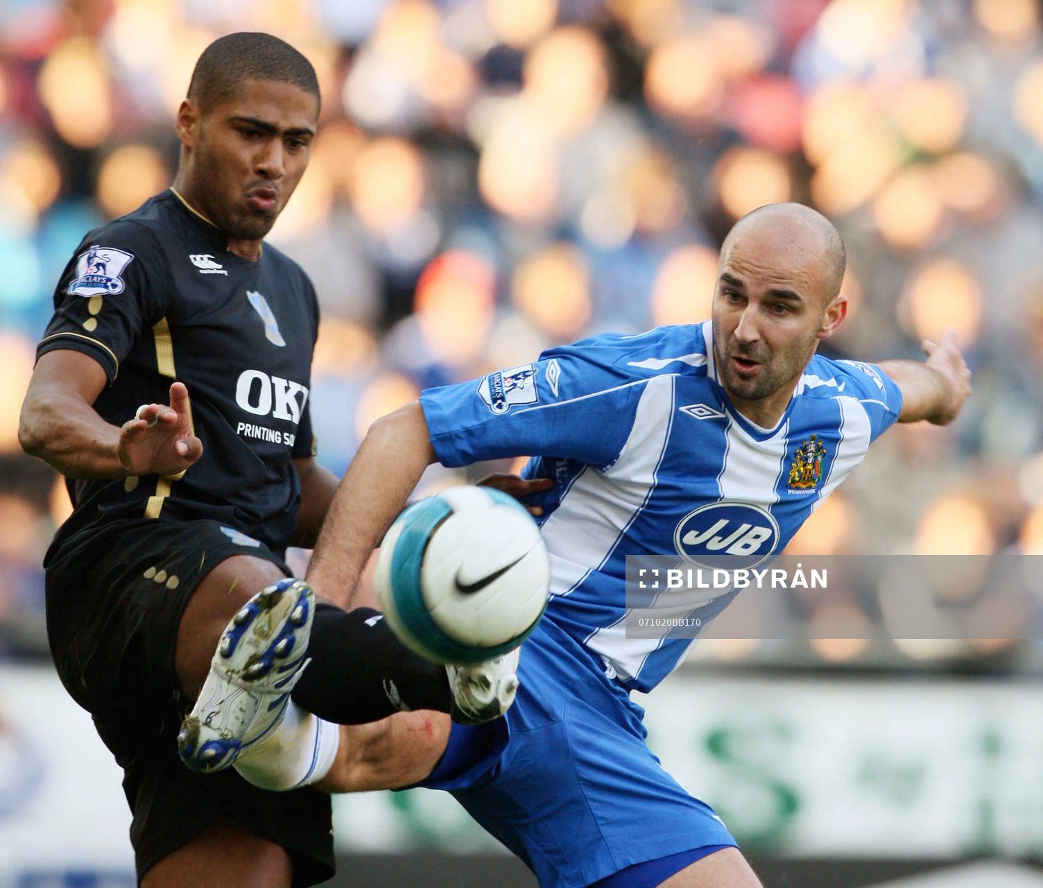 Antoine Sibierski och Glen Johnson