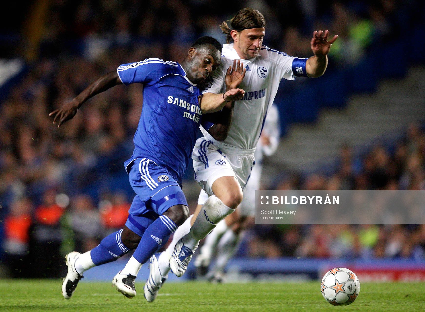  Michael Essien och Marcelo Bordon. 