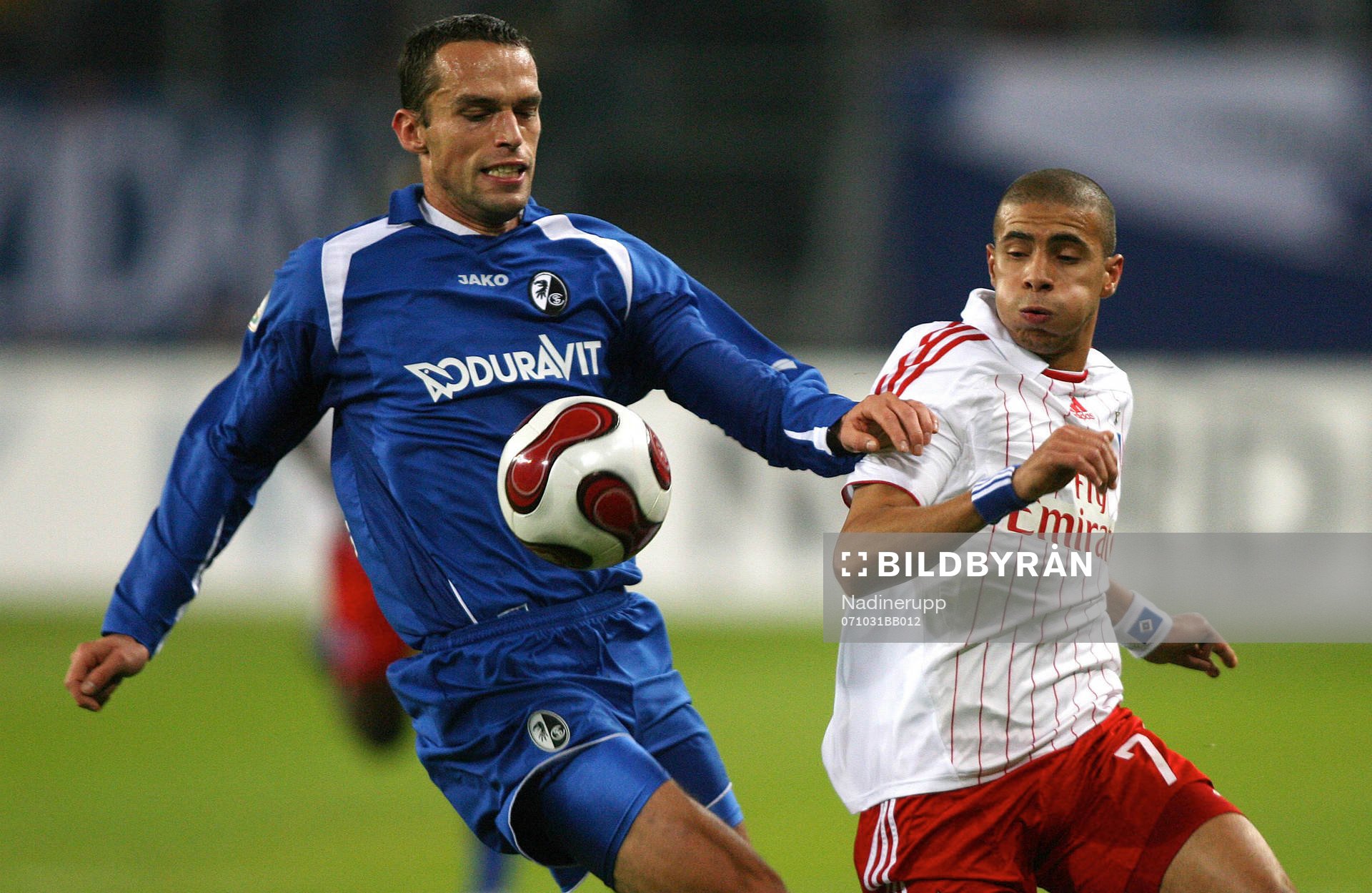   Pavel Krmas, Freiburg och Mohamed Zidan, Hamburg.