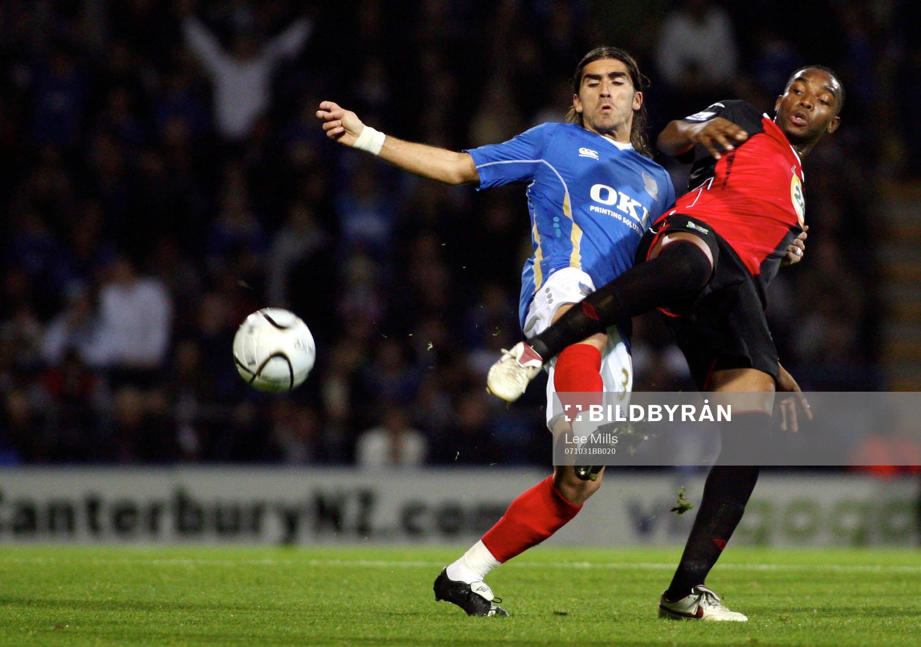   Pedro Mendes, Portsmouth och  Benni McCarthy, Blackburn.