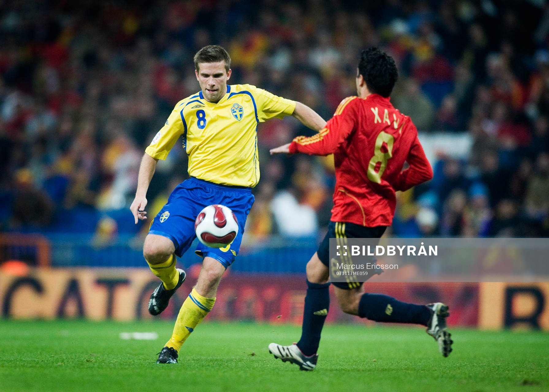 Anders Svensson och Xavi, Spanien