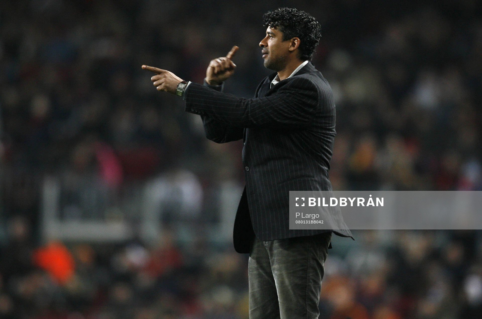   Frank Rijkaard, tränare. 