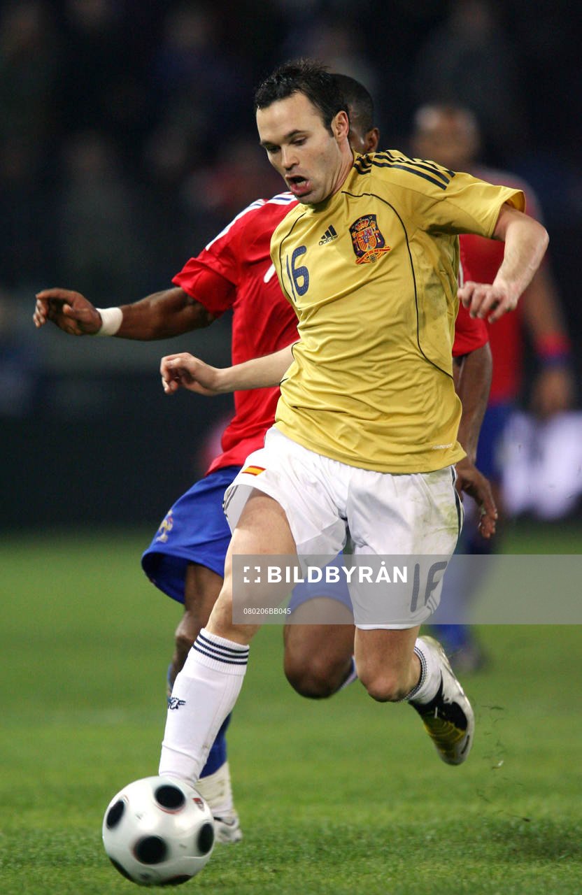 Andres Iniesta och Florent Malouda