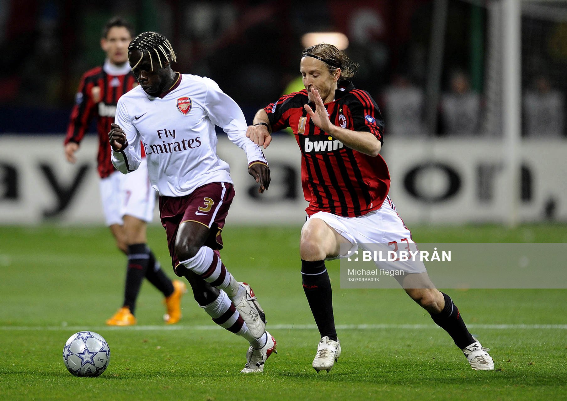 Bacary Sagna och Massimo Ambrosini
