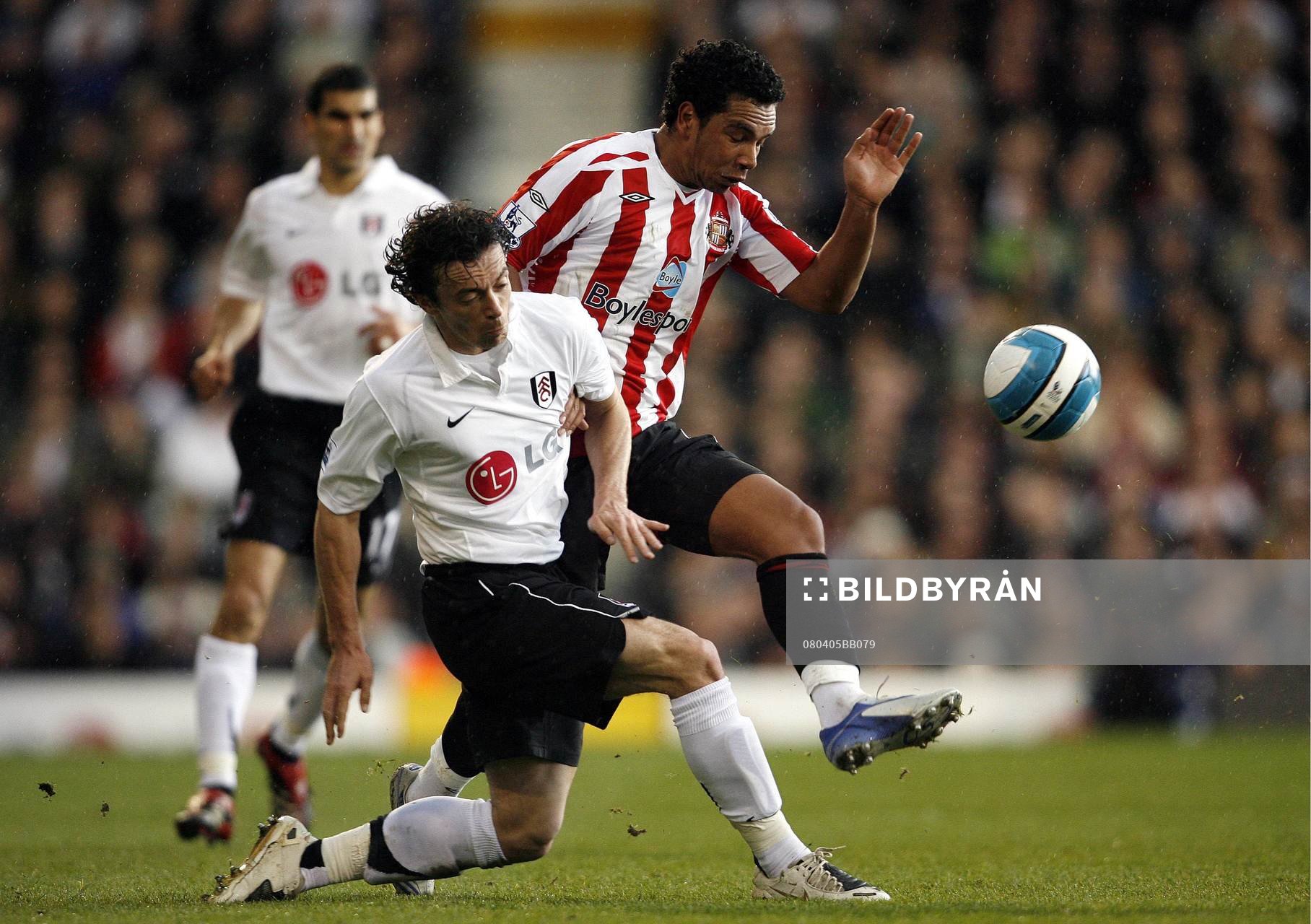 Simon Davies och Kieran Richardson