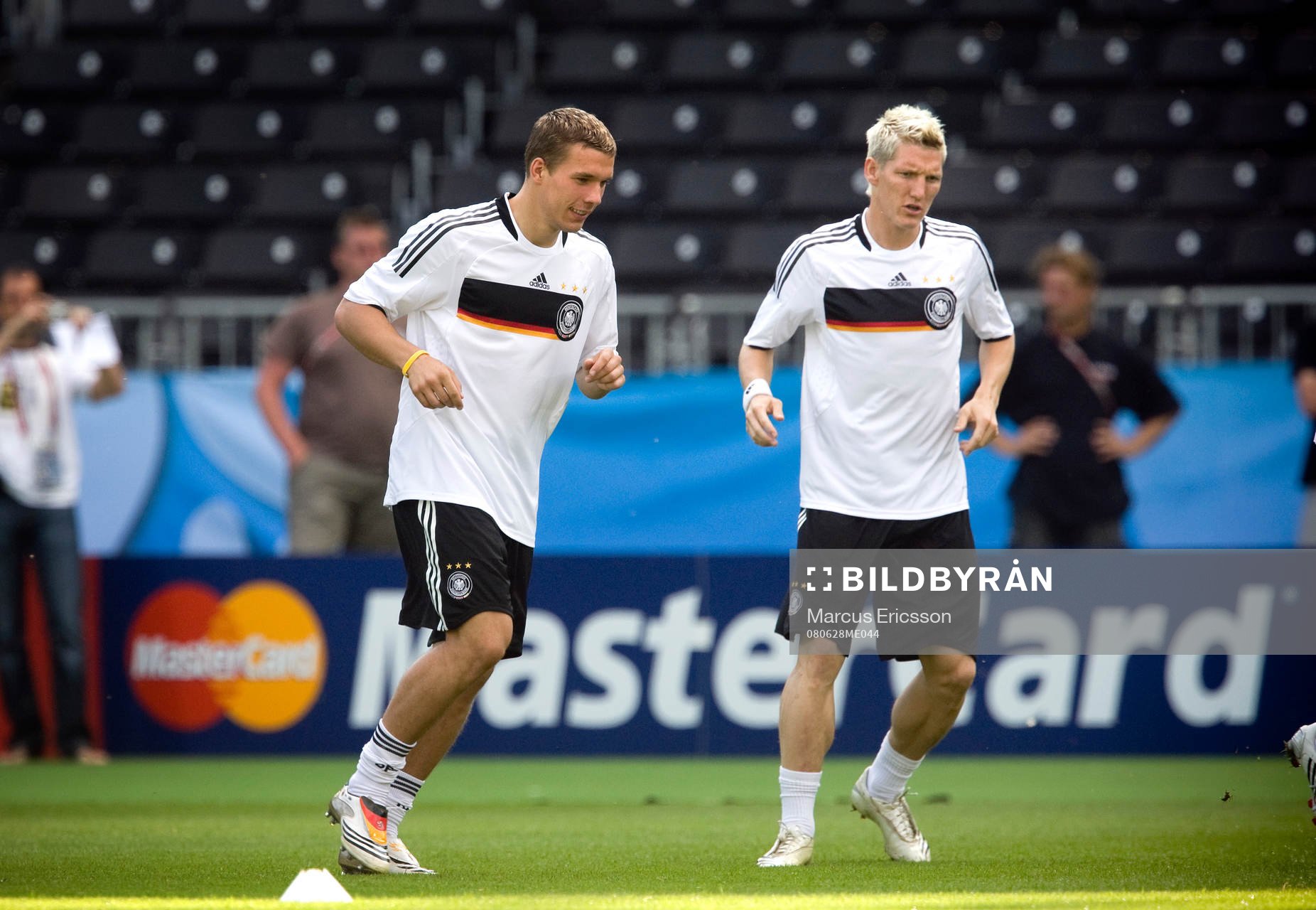 Lukas Podolski och Bastian Schweinsteiger