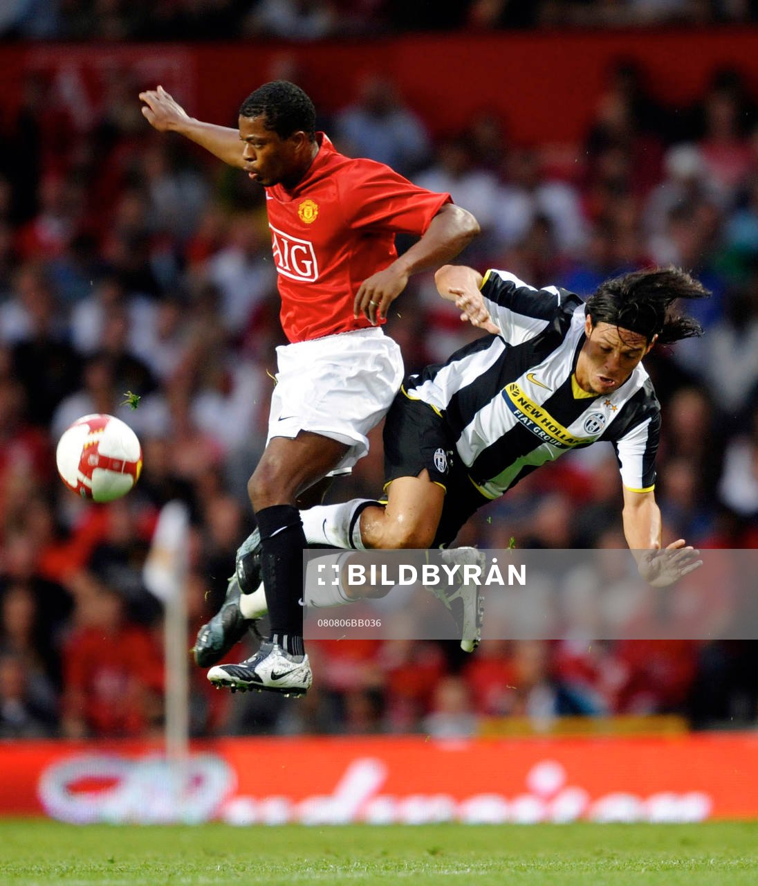 Patrice Evra och Mauro Camoranesi