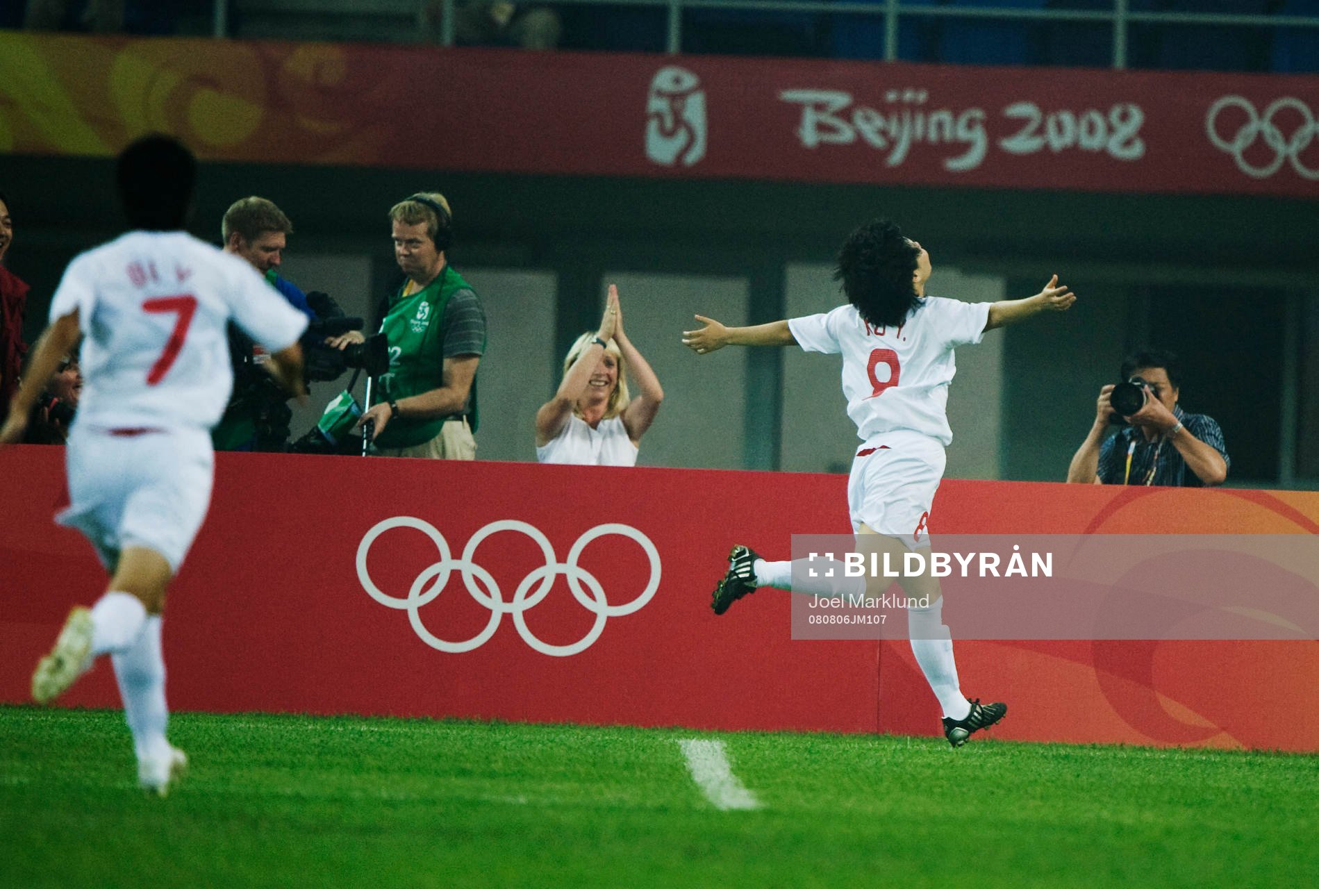  Yuan Xu, Kina, jublar efter 1-0.