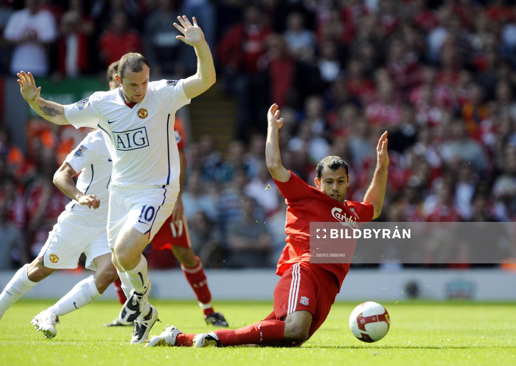  Wayne Rooney, Manchester United och Javier Mascherano, Liverpool.