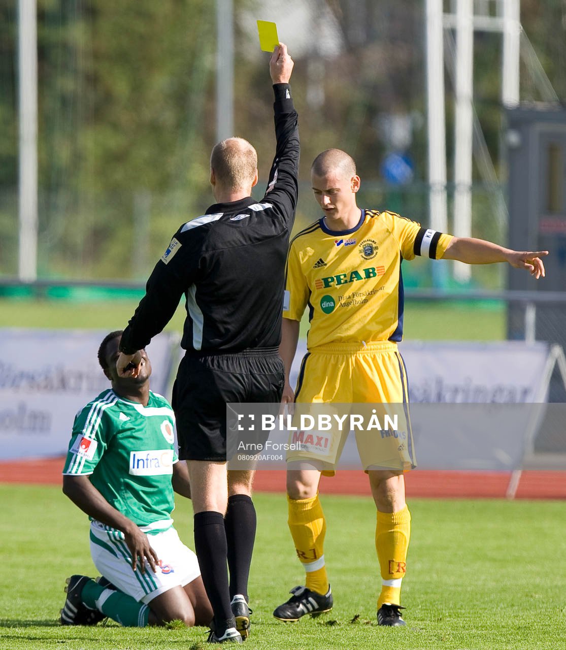 Domare, gult kort, varning