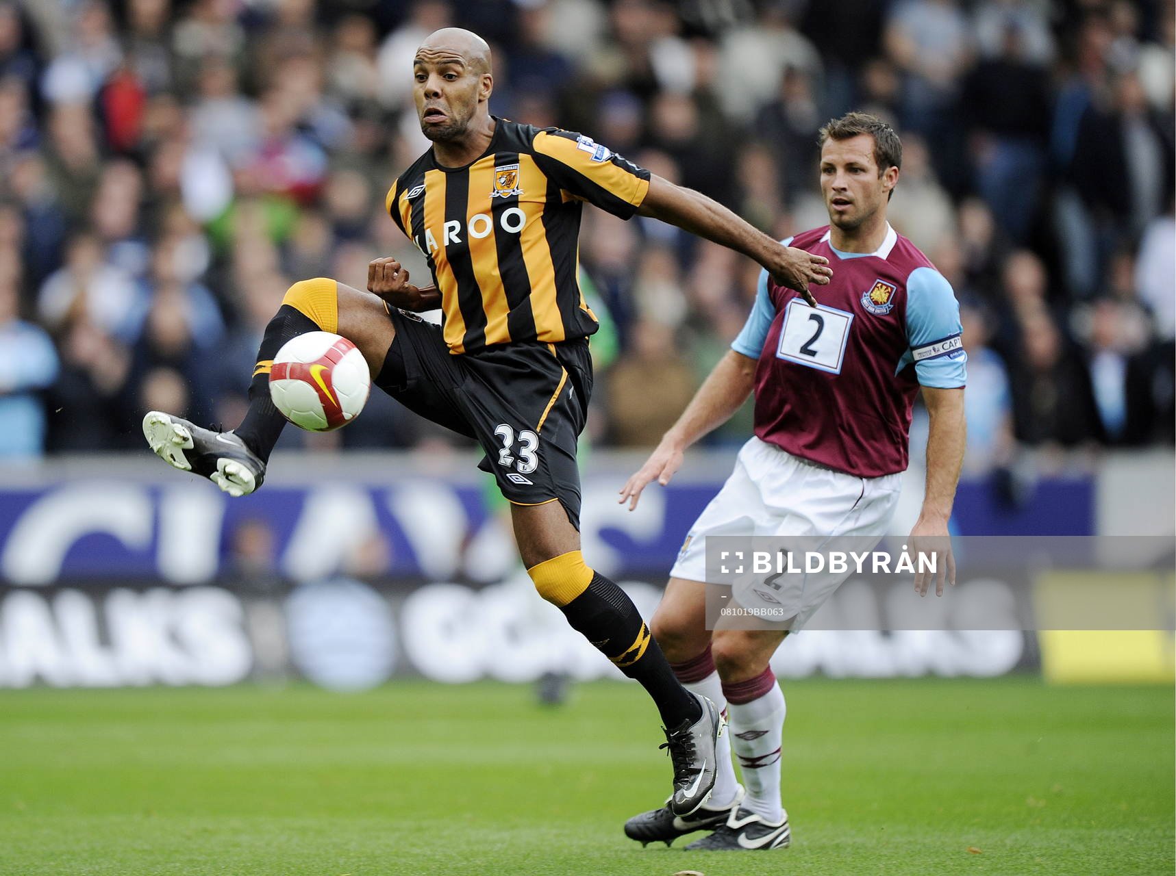  Marlon King, Hull och Lucas Neill, West Ham.