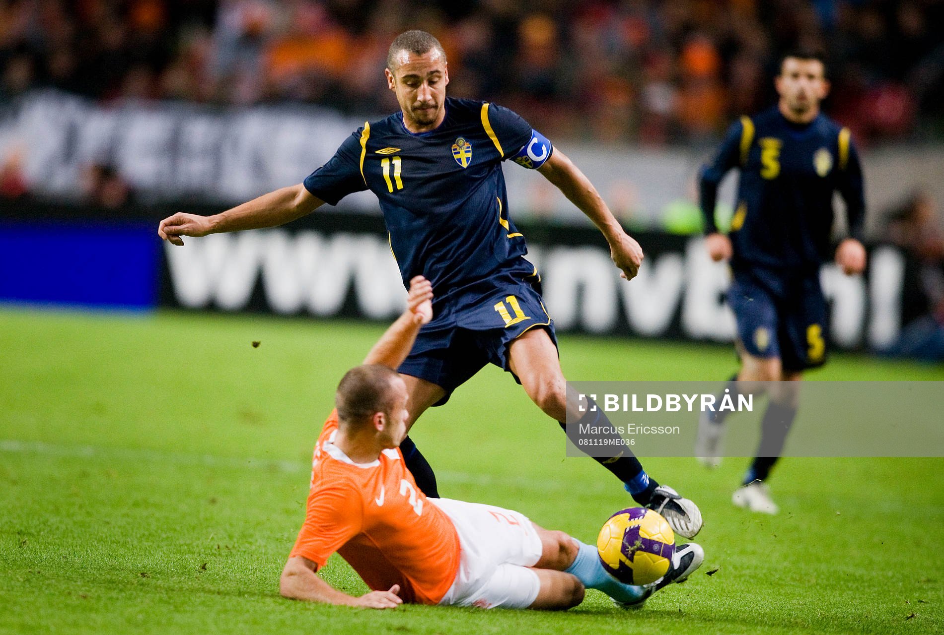 Henrik Larsson, Sverige och John Heitinga, Holland