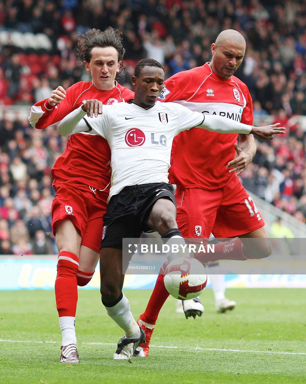 John Pantsil, Fulham, mot Tuncay Sanli och Afonso Alves, Middlesbrough. 