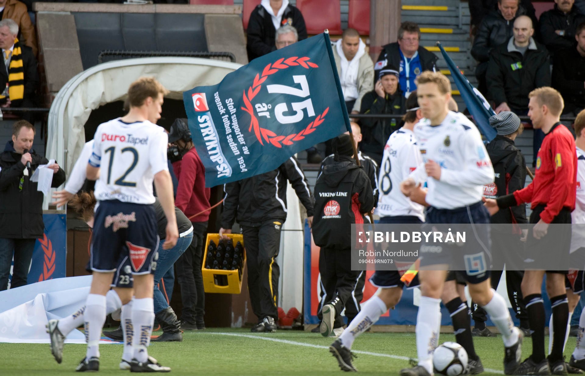 Spelarentré, utgångsmarch, flagga, fanbärare,