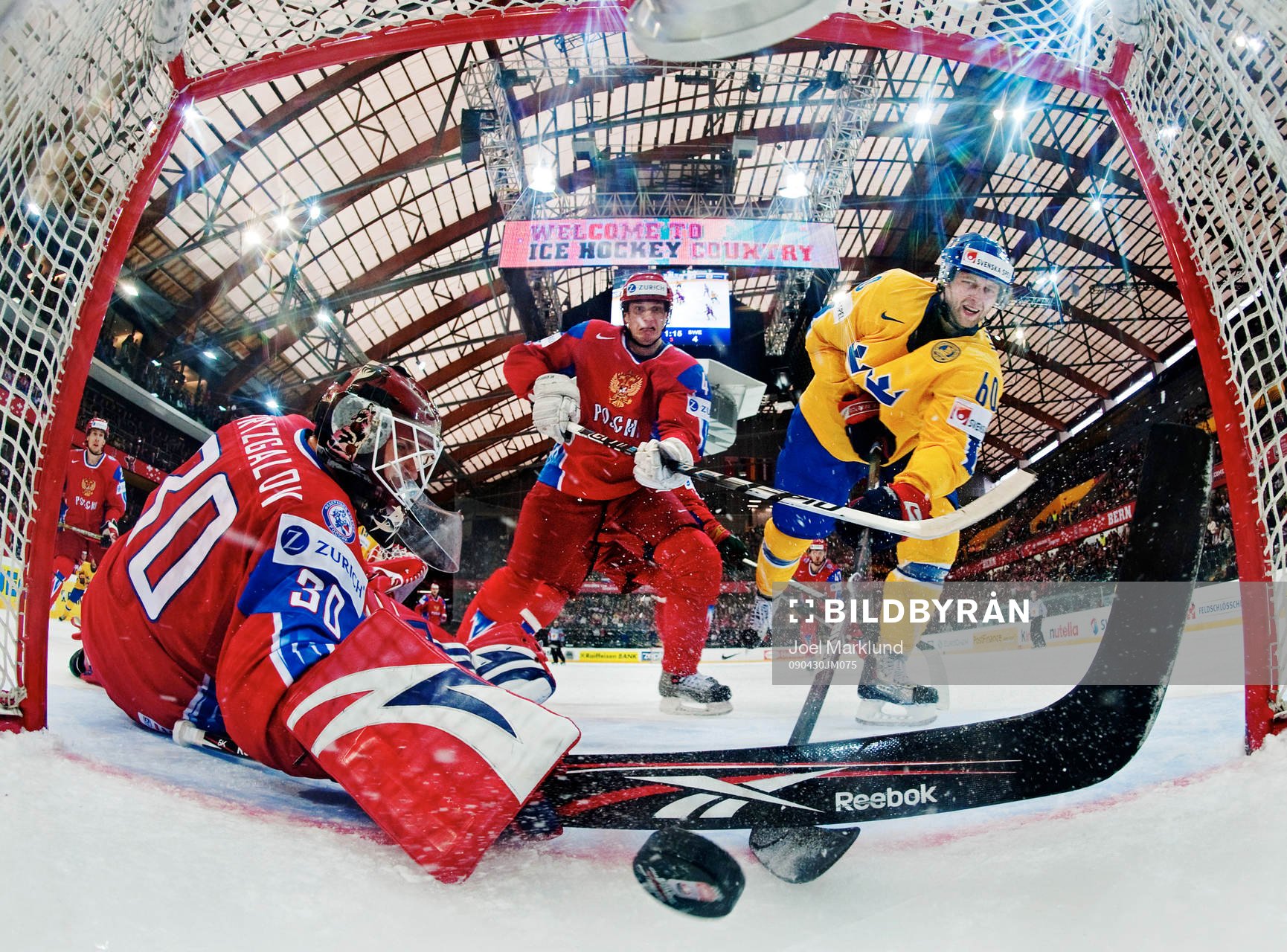 The Russian goaltender Ilya Bryzgalov can't reach the puck