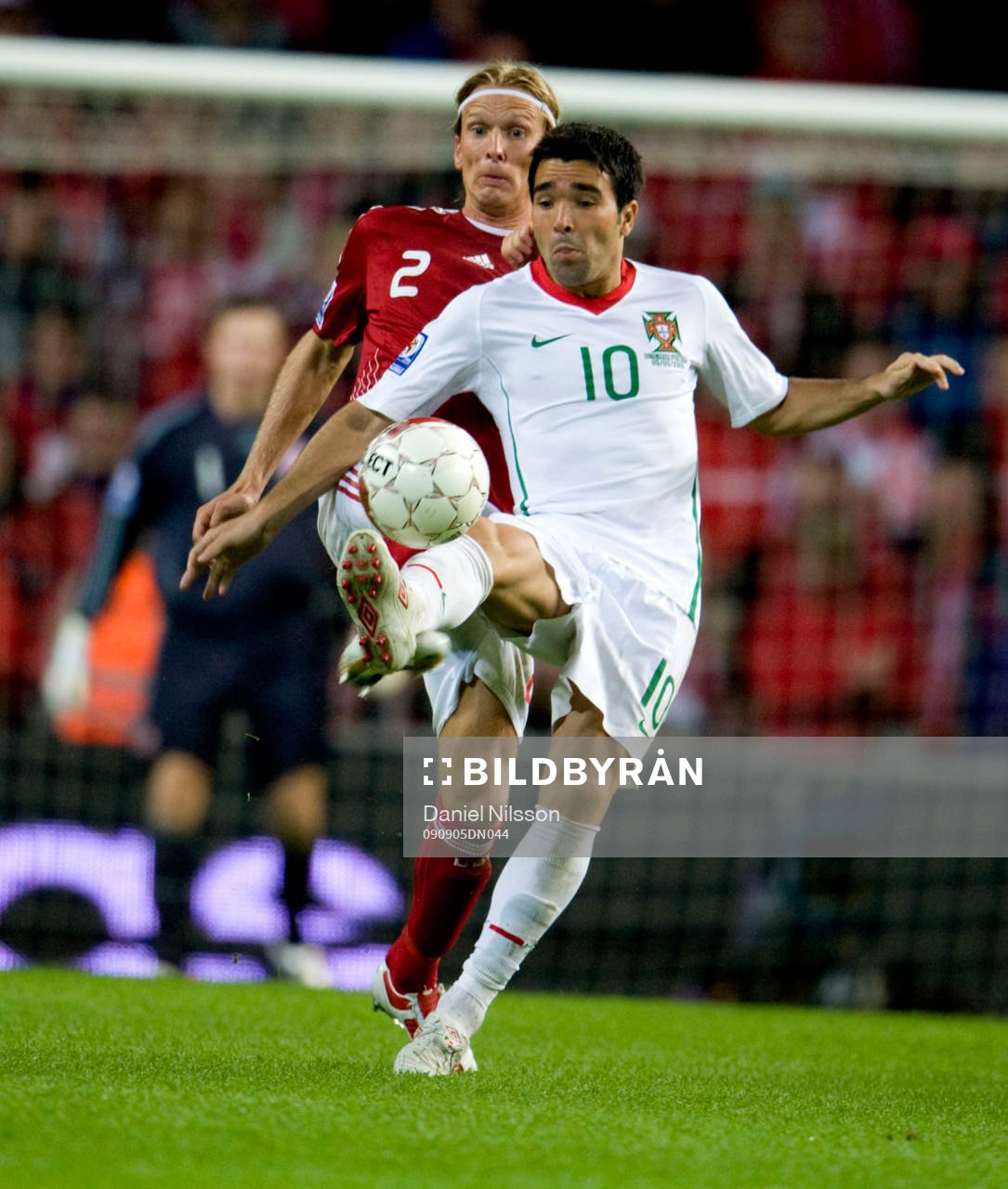 Deco, Portugal och Christian Poulsen, Danmark