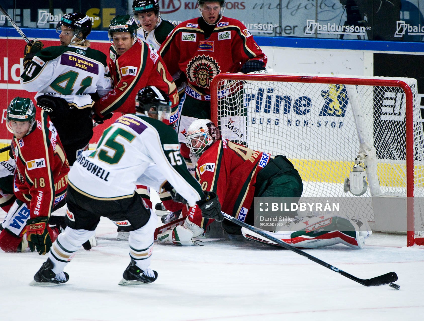 Kent McDonell, Färjestad. Johan Holmqvist, målvakt,