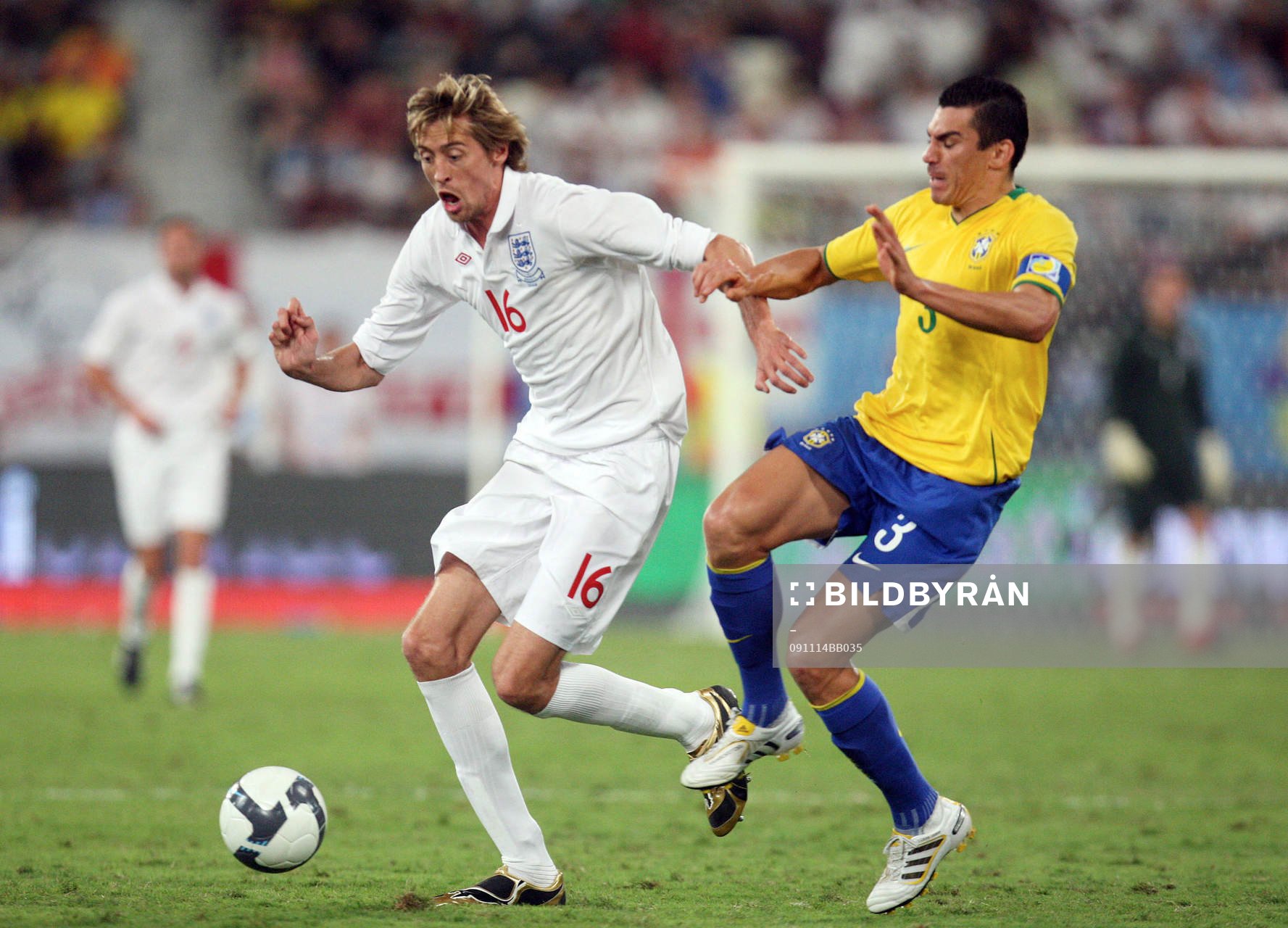 Peter Crouch, England och Lucio, Brasilien