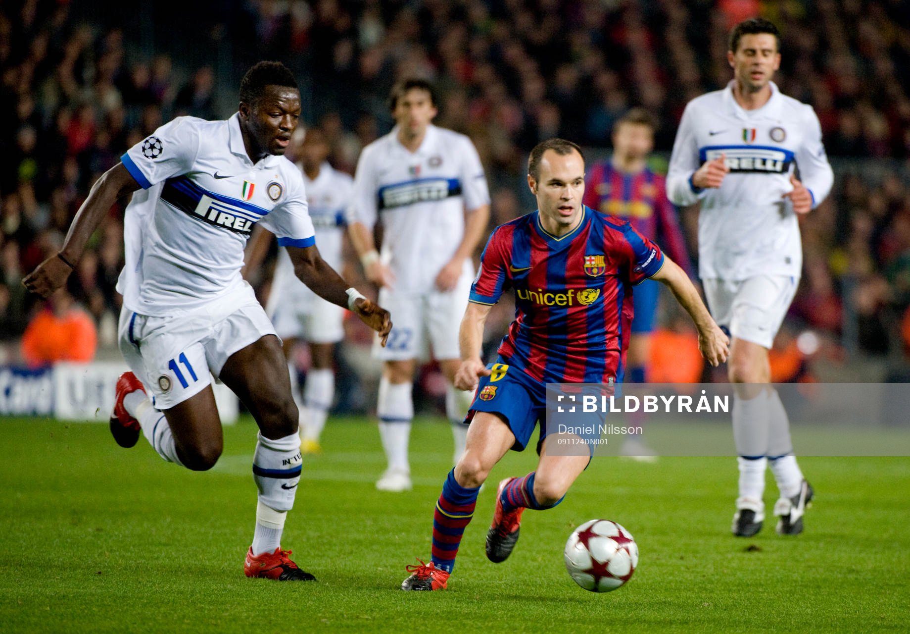 Andres Iniesta, Barcelona och  Sulley Muntari, Inter
